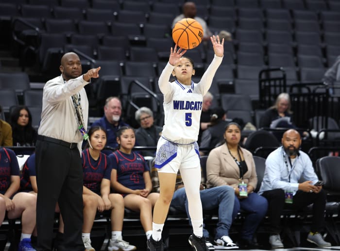 Tyliana Velasquez let's loose with one of her 10 3-point tries and one of her four 3-point makes.